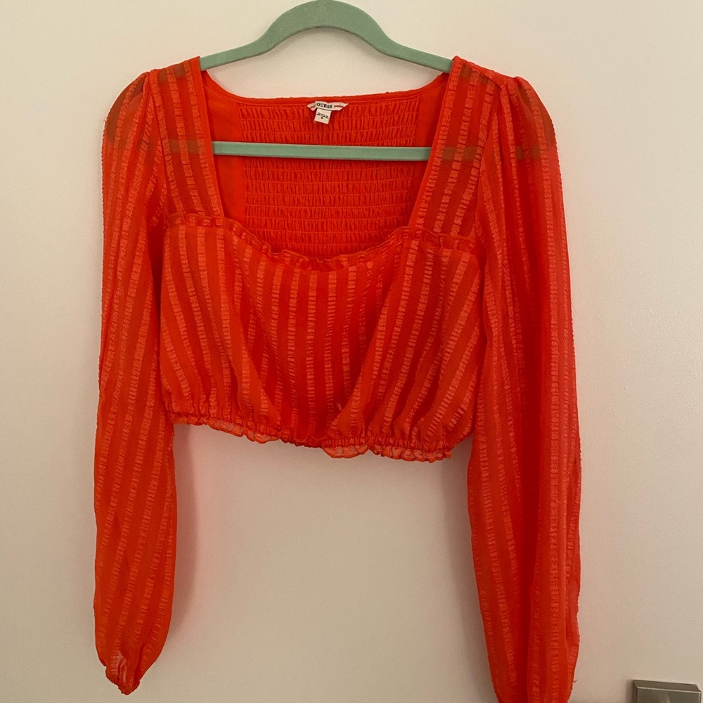 Orange crop top.
